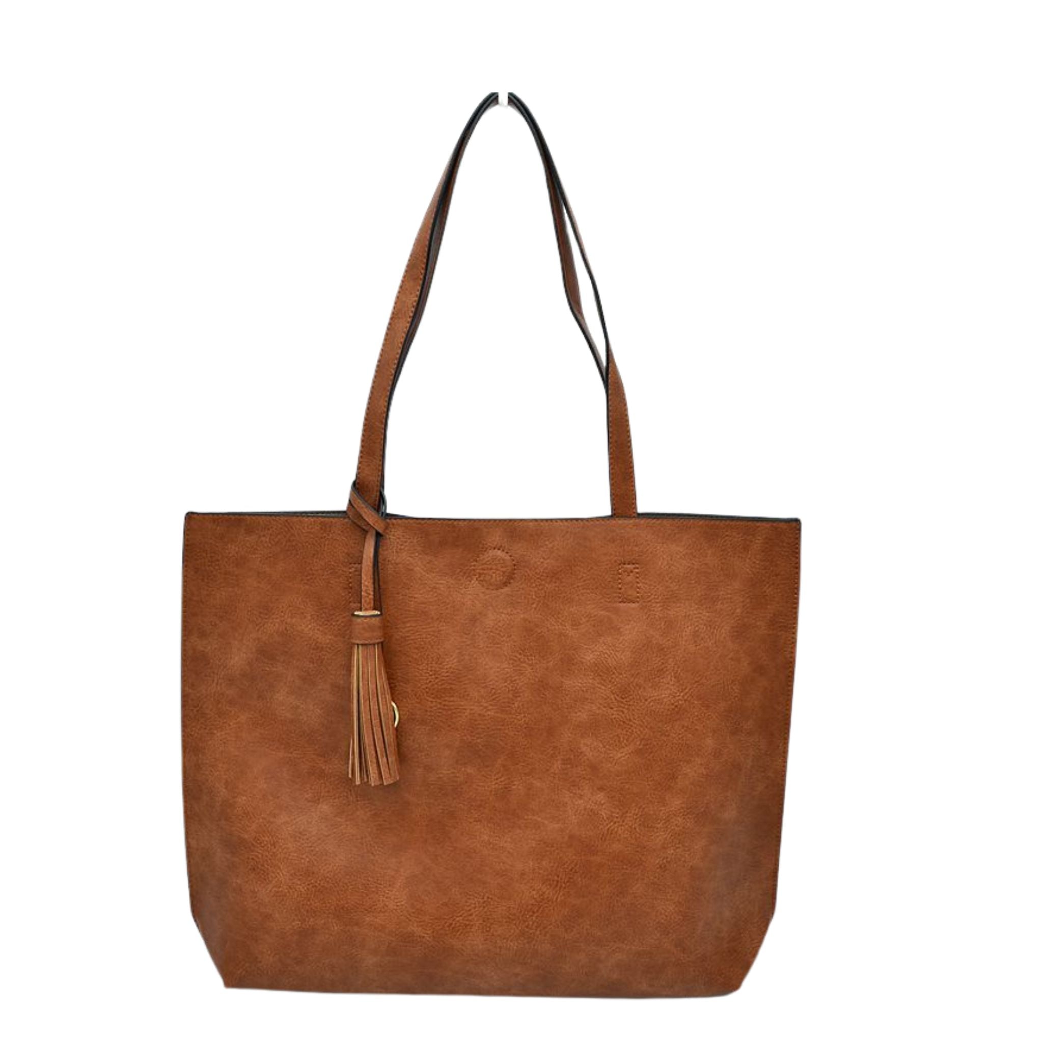 Brown leather tote bag with a tassel on a white background