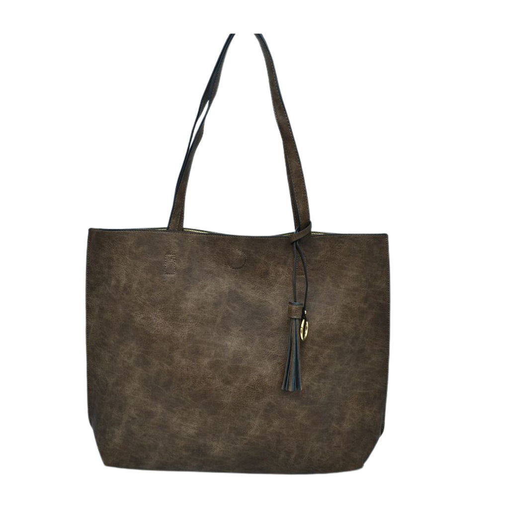 Brown leather tote bag with a strap on a white background