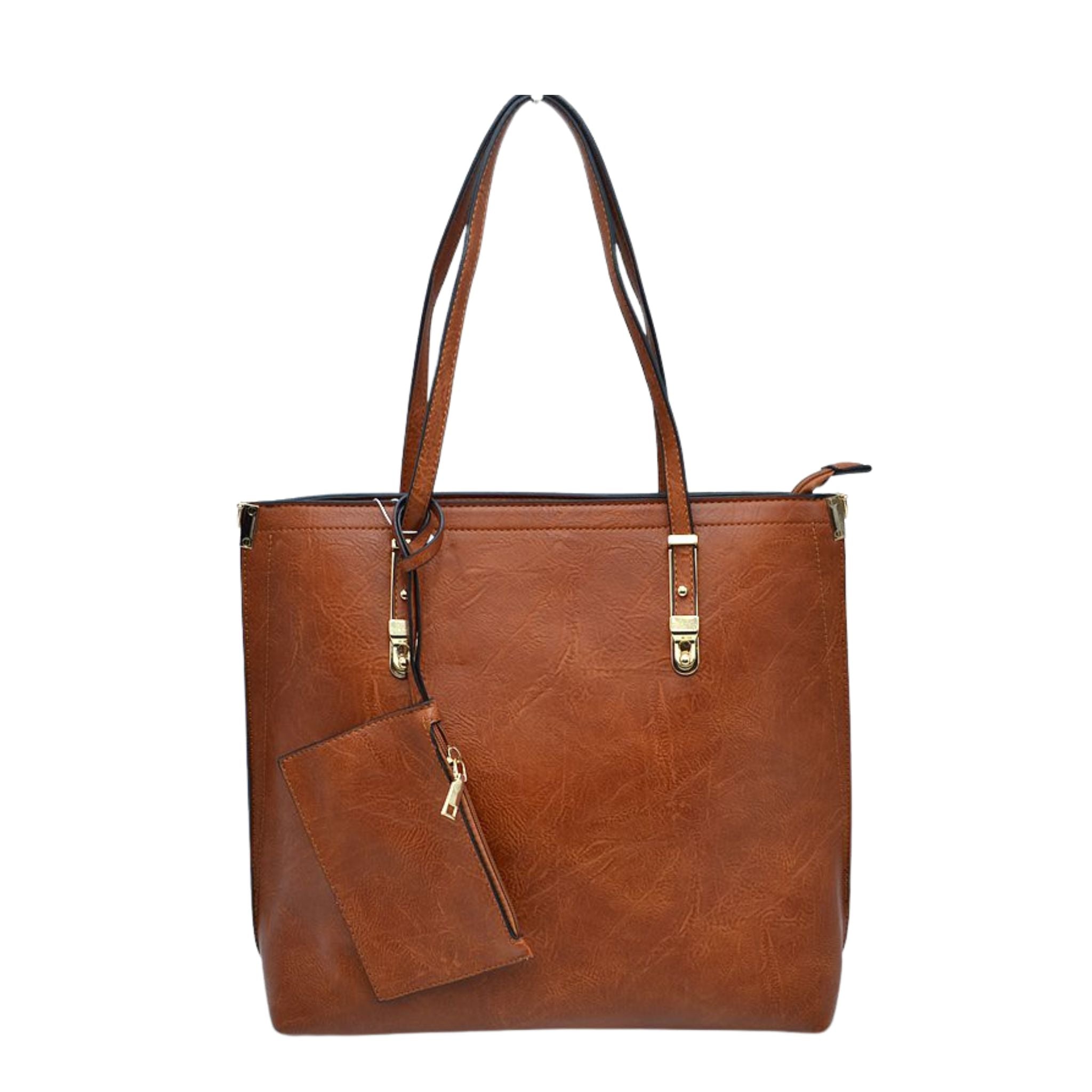 Brown leather tote bag with matching pouch on a white background