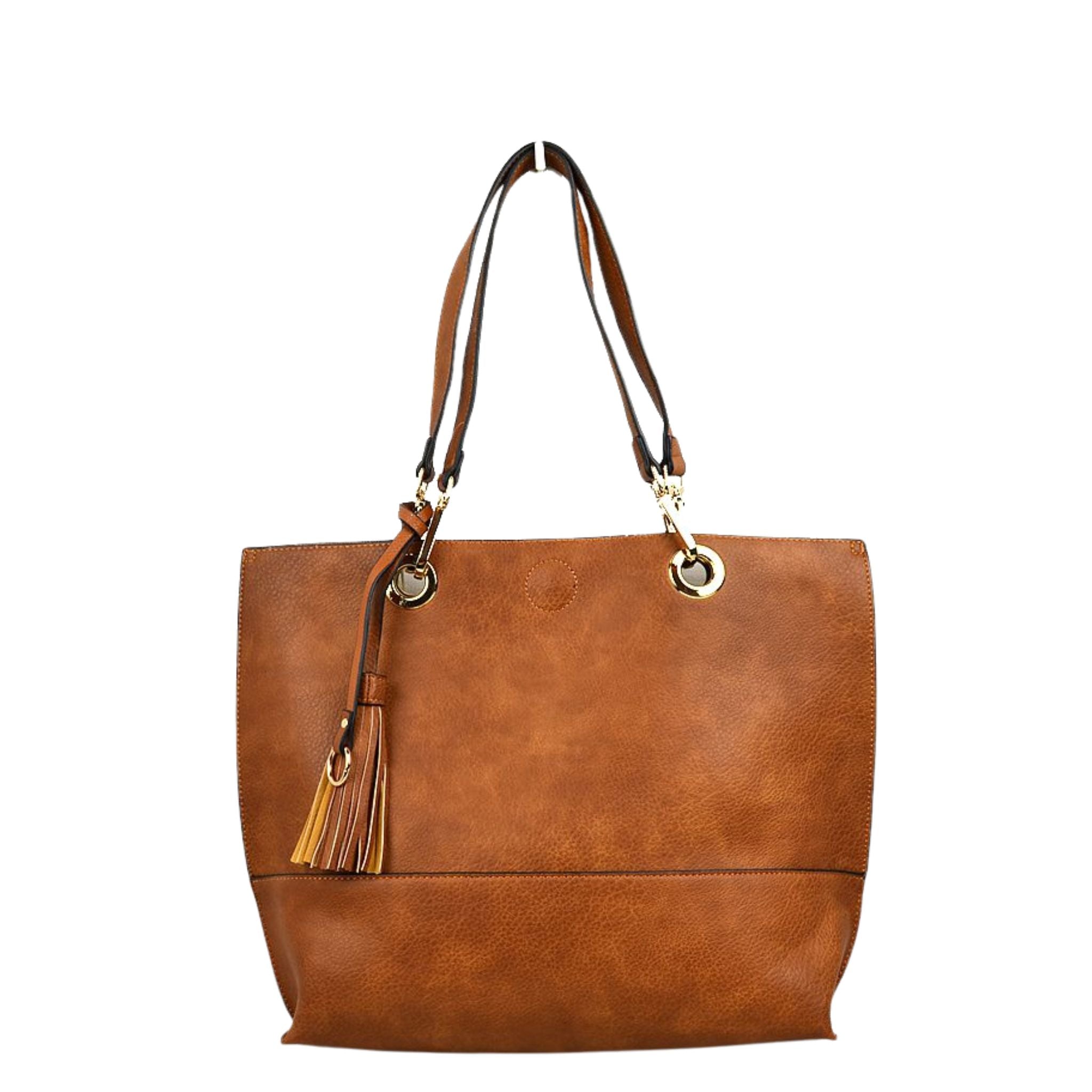 Brown leather tote bag with tassel on a white background