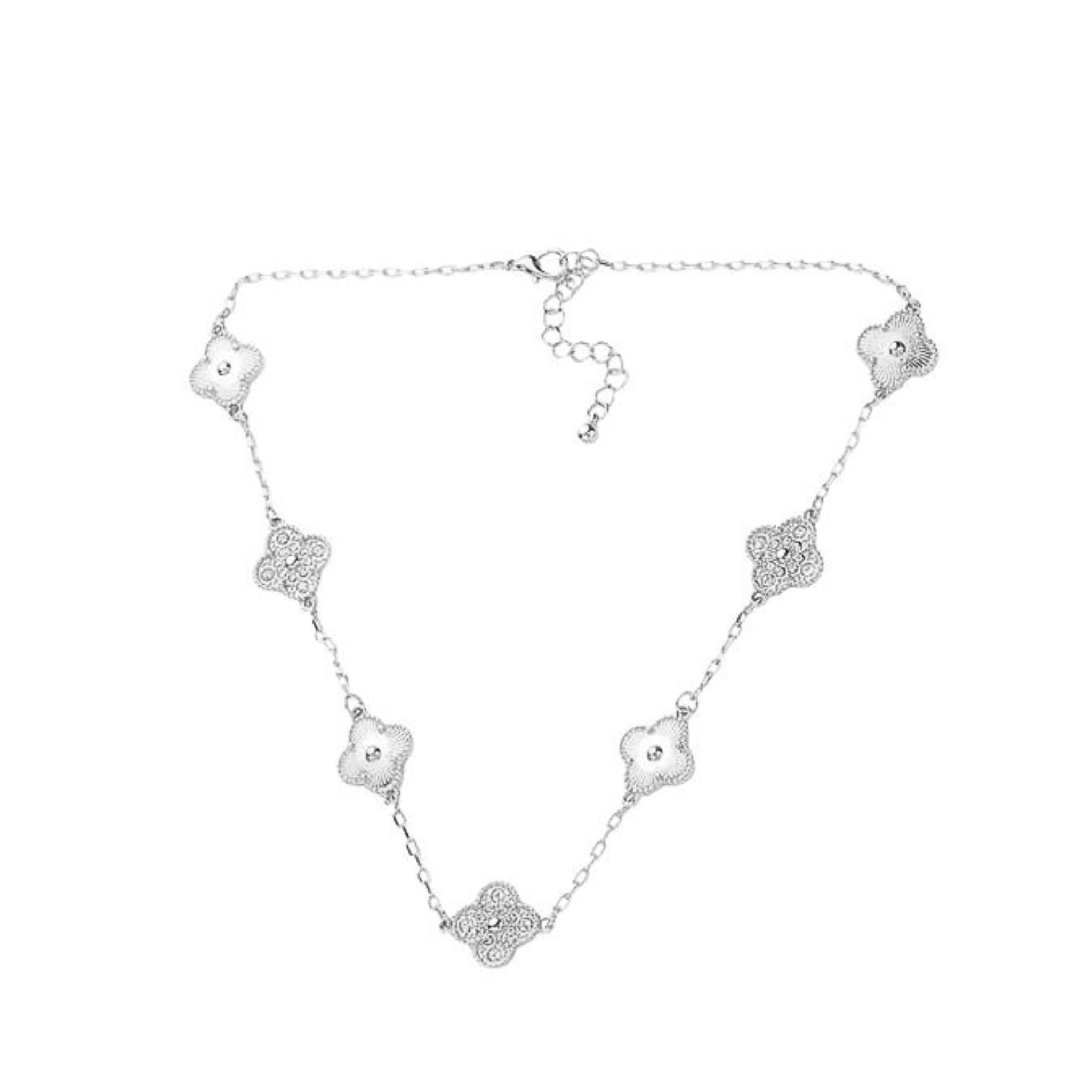 Silver necklace with floral pendants on a white background