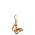Gold butterfly charm on a white background