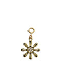 Gold flower-shaped charm with a central gem on a white background