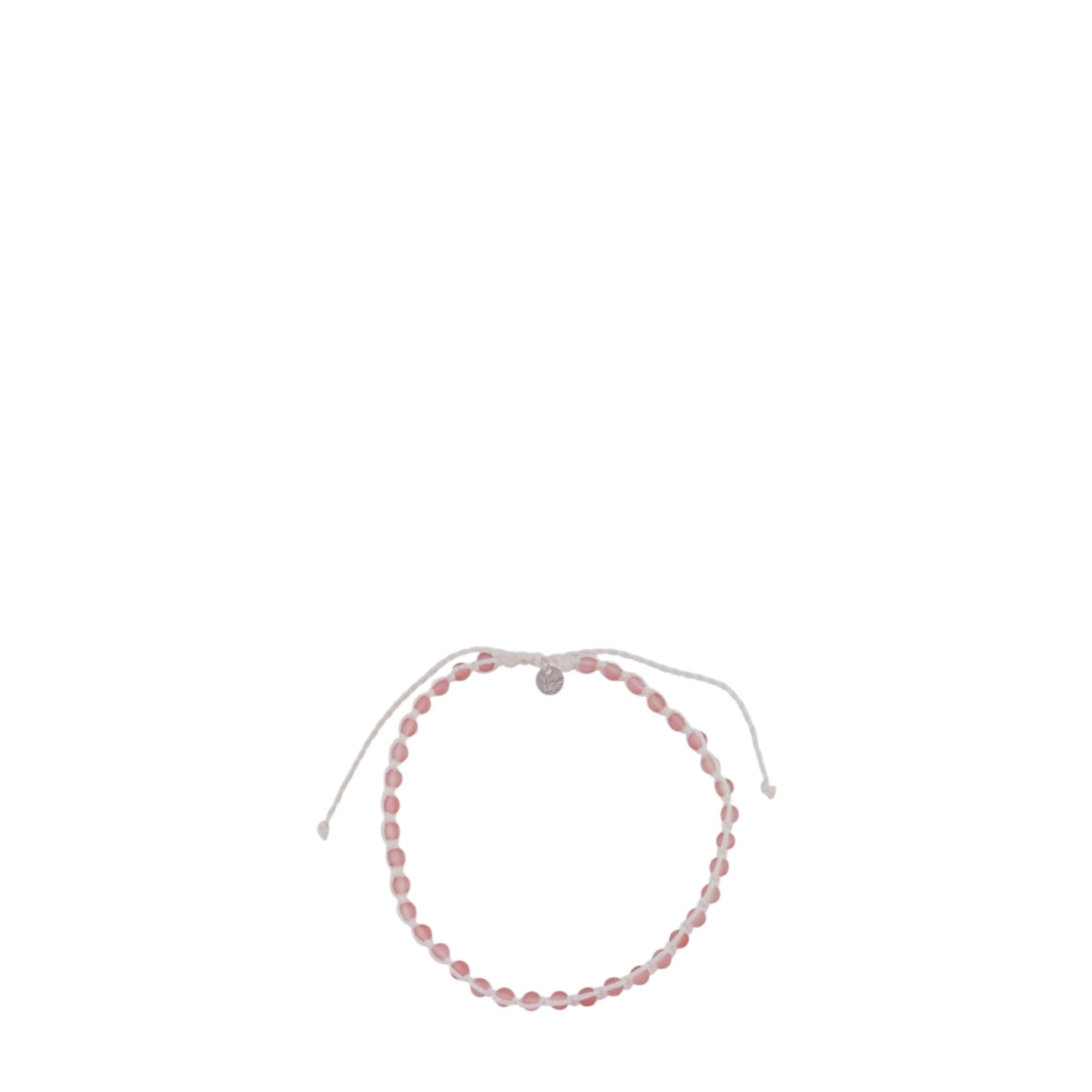 Pink beaded bracelet on a white background