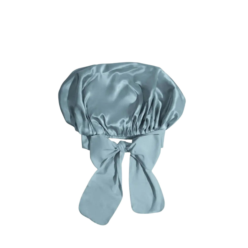 Light blue satin bonnet on a white background