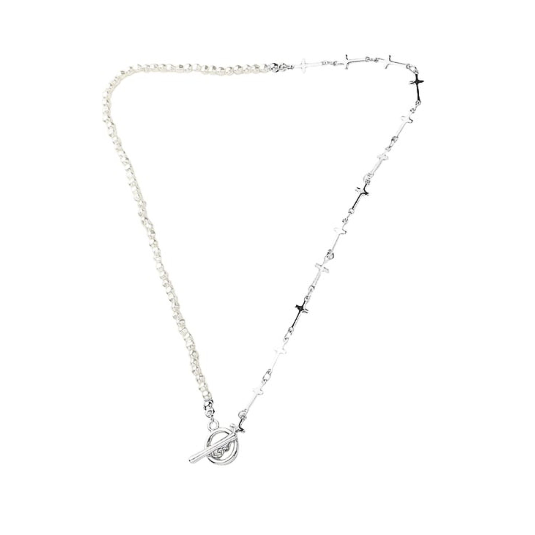 Silver necklace with small pendants on a white background