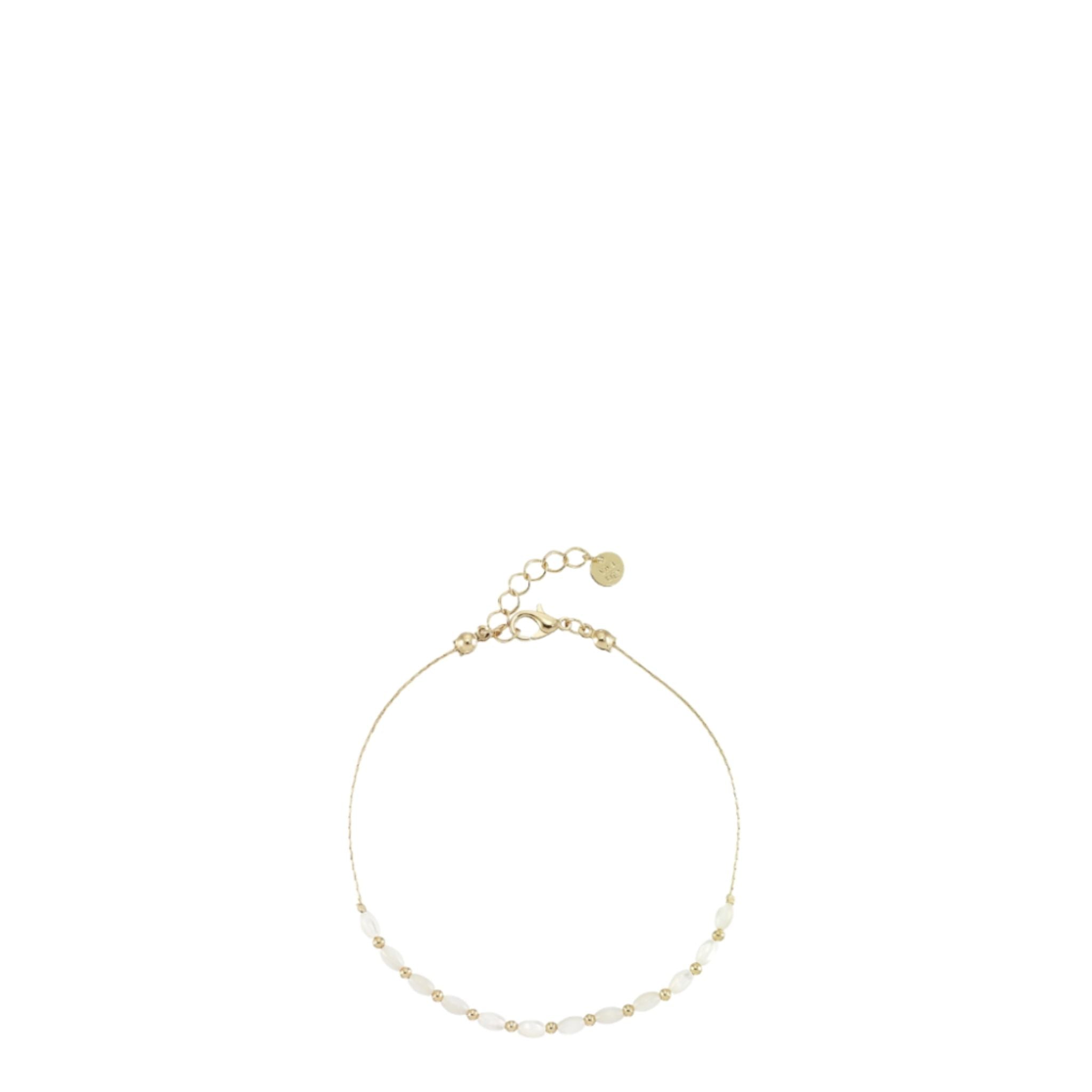 Gold bracelet on a white background