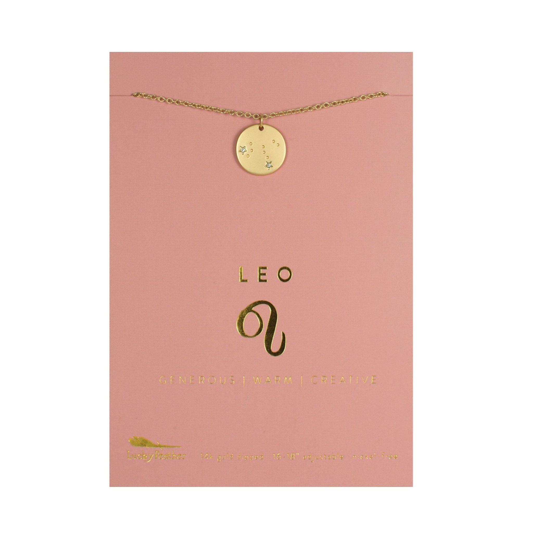 Gold necklace with 'Leo' pendant on a pink card